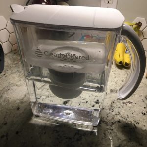 clearly filtered water pitcher kitchen countertop setup