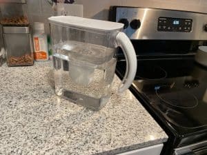 clearly filtered water pitcher on kitchen counter clearly filtered water pitcher on kitchen counter
